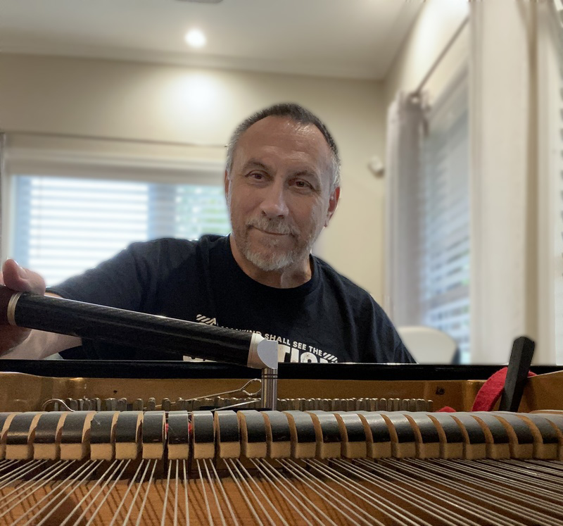 Dmitry — piano technician